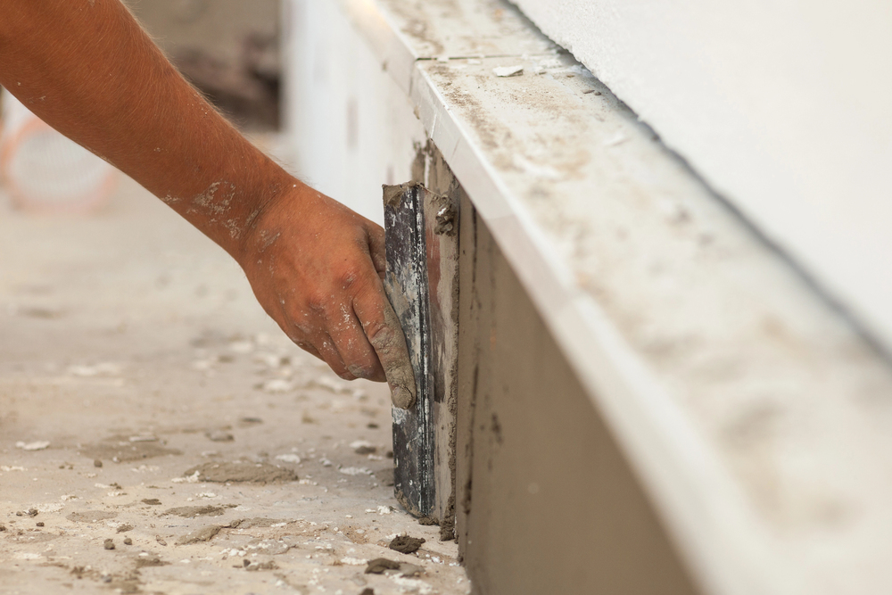 man doing foundation repair