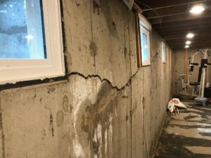 A diagonal crack often points to differential settlement, where one part of your foundation is sinking faster than another.