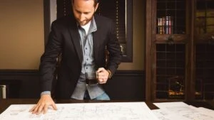 Structural Inspection Houston Image of Structural Commercial Building Inspector looking at structural drawing
